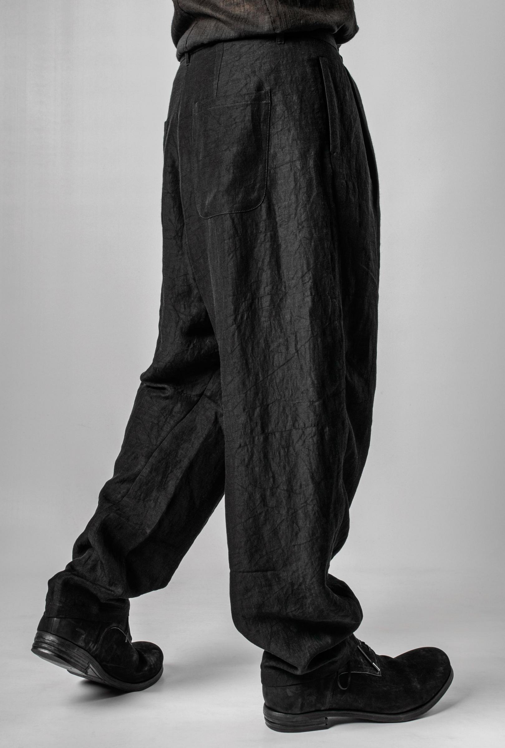 Individual Sentiments Textured Tapered Wide Trousers | Elixirgallery
