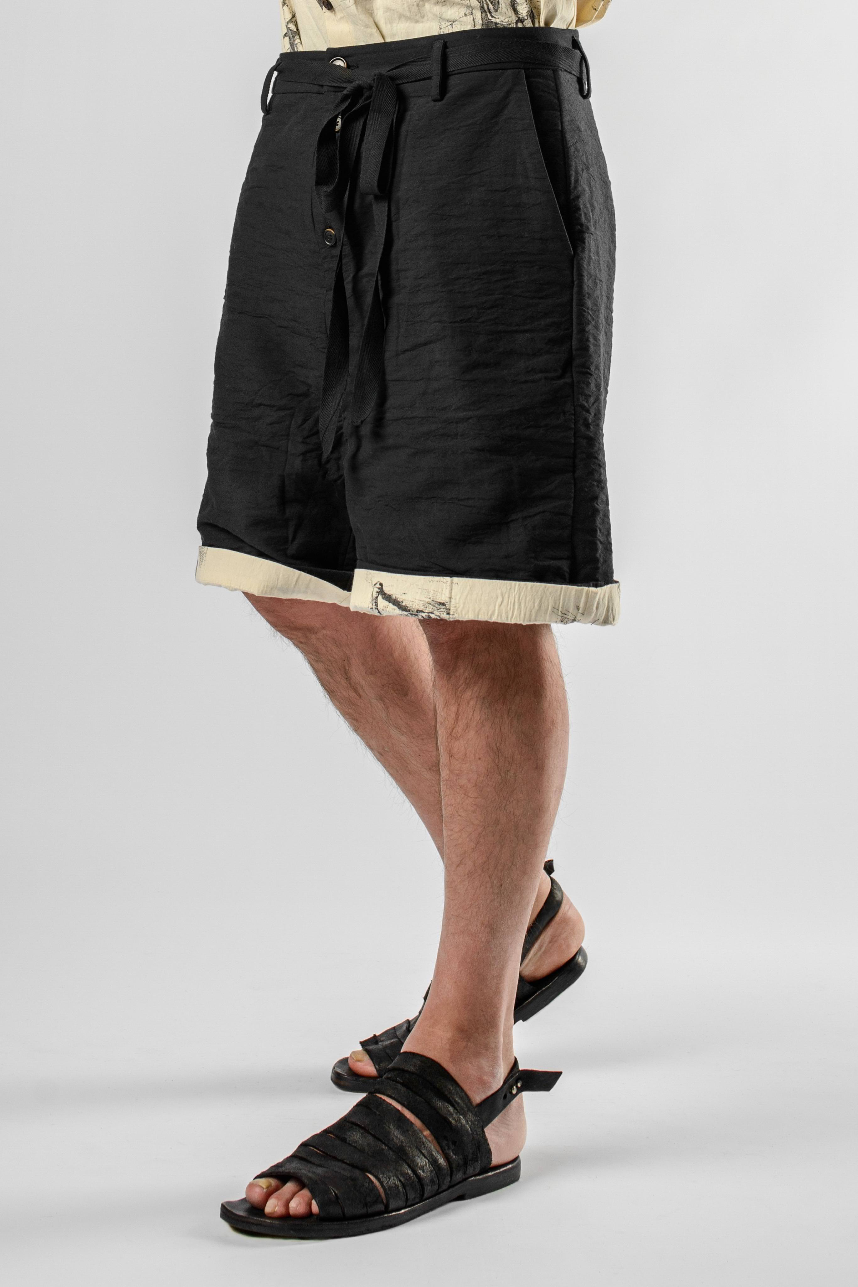 Aleksandr Manamis Layered Loose Shorts in color Black | Elixirgallery